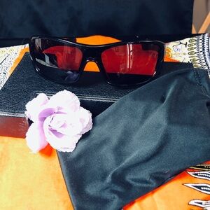 Stylish Black Oakley Sunglasses with Red Lenses